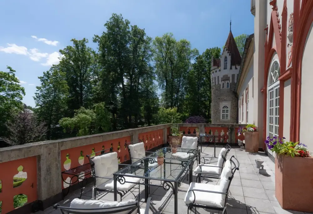 The terrace of Château Herálec with a view of its tower