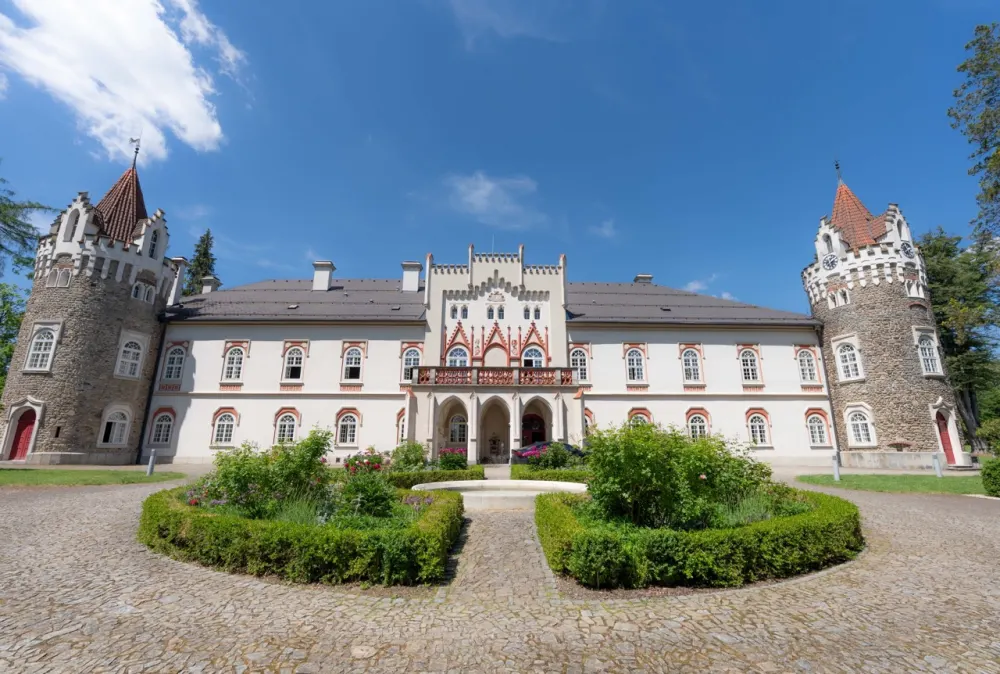 The facade of Château Herálec with its two towers